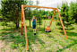 Деревянные качели Капризун Р911-5 с качелями Гнездо 60 см и трапецией 