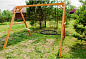 Деревянные качели Капризун Р911-23 с качелями Гнездо 100 см и гибкими качелями 